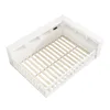 A white wooden bed frame with a slatted base, viewed from a high angle. Voir les images du produit