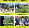 Collage of four images showing people playing PaddleSmash in different outdoor settings: beach, park, by a lake, and at a festival. Produktbild-Vorschau
