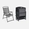 A single unfolded chair and a stack of folded chairs. Anteprima dell’immagine prodotto