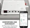 A close-up of a white heating device with a digital display and buttons, next to a smartphone showing a control app. Produktbild-Vorschau