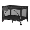 A black travel crib with a gray organizer attached to the side, shown on a white background. Produktbild-Vorschau
