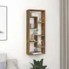 A narrow, vertical wooden shelf unit with multiple compartments is mounted on a white wall. Various decorative items, including books, a mug, a vase with greenery, a diffuser, and a starfish, are placed on the shelves. To the left, a portion of a framed bl Anteprima dell’immagine prodotto