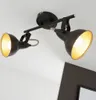 A black and gold metal ceiling spotlight with two adjustable lamps. Produktbild-Vorschau