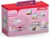 The image shows the back of a Schleich Sofia's Beauties Tier Salon playset box, displaying various scenes and accessories included in the toy. Produktbild-Vorschau