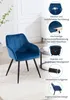A blue velvet armchair is shown in a room with a small table and a plant. Callouts highlight product features. Náhľad obrázku produktu