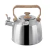 A stainless steel teapot with a wooden handle and lid knob, featuring a built-in thermometer. Voir les images du produit