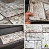 A collage of images showing 3D wall panels with a wood-like texture. One image shows a hand holding a panel, another shows a panel on a sofa, and the other two are close-ups of the panel's texture. Produktbild-Vorschau