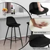 A collage of images showing black bar stools, with close-ups highlighting the softness and material of the seat. Produktbild-Vorschau