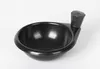 A black frying pan with an egg insert is shown against a white background. Voir les images du produit