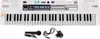 A white electronic keyboard with a microphone and power adapter, displayed on a white background. Produktbild-Vorschau