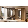 A bedroom scene featuring a wardrobe, dressing table, and bed. Produktbild-Vorschau