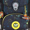 Close-up of a child's backpack with a space-themed pattern and attached charms. Voir les images du produit