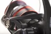 A close-up shot of a fishing reel. Produktbild-Vorschau