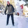A man is shoveling snow in a winter environment. Náhled obrázku produktu
