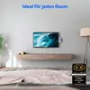 A TV mounted on a wall above a floating media console in a bedroom setting. Produktbild-Vorschau