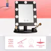 A makeup mirror with LED lights and storage compartments, displayed on a white surface with a pink background. Below the mirror are icons and text describing its features. Produktbild-Vorschau