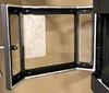 The image shows the inside of a fireplace door with an instruction manual attached. Anteprima dell’immagine prodotto
