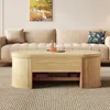 A living room scene featuring a light wood coffee table in front of a beige sofa. Náhľad obrázku produktu
