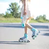 A person on roller skates holding a portable blender. Náhľad obrázku produktu