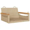 A beige poly rattan hanging chair with wooden armrests, shown from a front-side angle against a white background. Náhled obrázku produktu