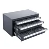 A gray metal cabinet with three drawers filled with drill bits. Anteprima dell’immagine prodotto