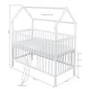 A white wooden baby crib with a house-shaped frame, shown with dimensions and labels. Produktbild-Vorschau