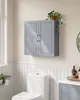 A bathroom scene with a wall-mounted cabinet above a toilet. Náhled obrázku produktu