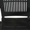 Close-up of the back of a black folding chair. Anteprima dell’immagine prodotto