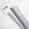 A close-up shot of a clear plastic shower door seal with a white label in the background. Produktbild-Vorschau