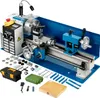 A mini metal lathe and its accessories are displayed on a white background. Produktbild-Vorschau