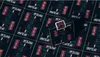 A deck of Bicycle playing cards with a cyberpunk theme is placed on a surface with a repeating pattern of the same card design. Voir les images du produit
