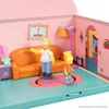 A miniature replica of the Simpsons' living room, featuring Homer and Bart Simpson figures. Podgląd zdjęcia produktu