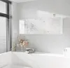 A modern bathroom with a wall-mounted cabinet and decorative elements. Produktbild-Vorschau