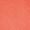 A close-up of an orange fabric with a herringbone pattern. Produktbild-Vorschau