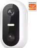 A white smart outdoor camera with a black front panel, featuring a lens, an LED light, and a motion sensor. A "Powered by Tuya" logo is in the top right corner. Produktbild-Vorschau