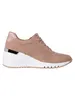 A side view of a single pink sneaker with a white wedge sole, set against a white background. Produktbild-Vorschau