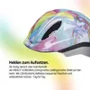 A close-up of a child's helmet with a unicorn and rainbow design, set against a gradient background. Produktbild-Vorschau