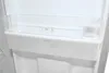 Interior view of a refrigerator with a clear plastic shelf and bin. Produktbild-Vorschau