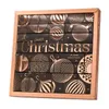 A Christmas advent calendar with decorative ornaments and numbered doors. Produktbild-Vorschau