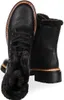 A pair of black fur-lined boots. Voir les images du produit