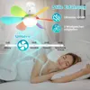 A colorful ceiling fan with integrated LED light is shown above a sleeping woman. The image highlights the fan's quiet operation and multiple speed settings. Náhled obrázku produktu