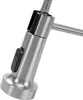 A close-up view of the head of a brushed steel kitchen faucet, showing the pull-down spray nozzle and a black button. Náhľad obrázku produktu