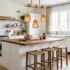 A bright and modern kitchen with a wooden island and pendant lights. Produktbild-Vorschau