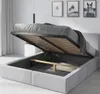 A bed with its storage compartment open, showing the slatted base and wooden supports. Produktbild-Vorschau