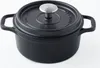 A black cast iron pot with a silver lid handle is shown against a white background. Voir les images du produit