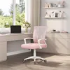 A pink office chair is placed next to a desk with a laptop and flowers, in front of a window with trees outside. Podgląd zdjęcia produktu