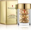 A product shot of Elizabeth Arden Advanced Ceramide Capsules Daily Youth Restoring Serum, with its packaging to the left. Podgląd zdjęcia produktu