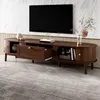 A modern wooden TV stand with a television on top, set against a marble-patterned wall. Podgląd zdjęcia produktu