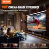 A group of people are watching a movie on a projector screen in a living room. Podgląd zdjęcia produktu
