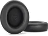 Two black ear pads for headphones are shown against a white background. One ear pad is shown from the front, with the letter 'R' visible inside. The other ear pad is shown from the side. Podgląd zdjęcia produktu